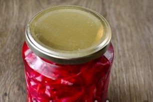 then put the cabbage in clean jars and cover with lids
