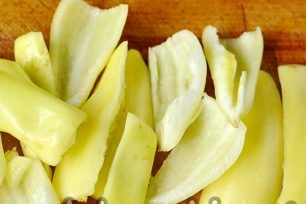 peppers are cleaned from the insides, washed from the remaining seeds and cut into several large slices