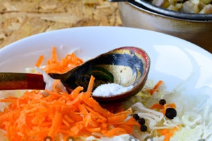 salt cabbage and carrots, add spices