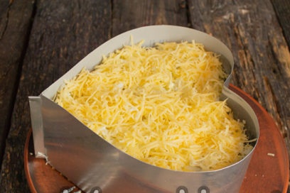 поръсете със сирене