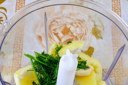 vegetables and herbs in a blender