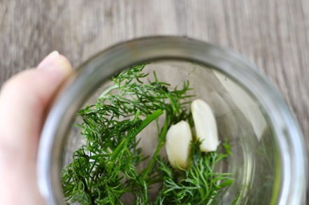 put in a jar of herbs and garlic