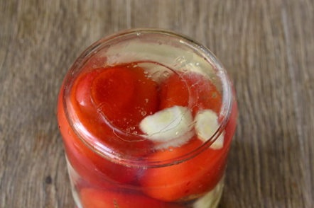 tanqueu la tapa del recipient